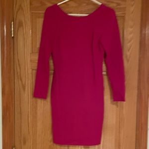 Pink open back dress.